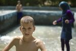 Swimming by the river CYC Summer Camp 2010 - Palestinian k. 